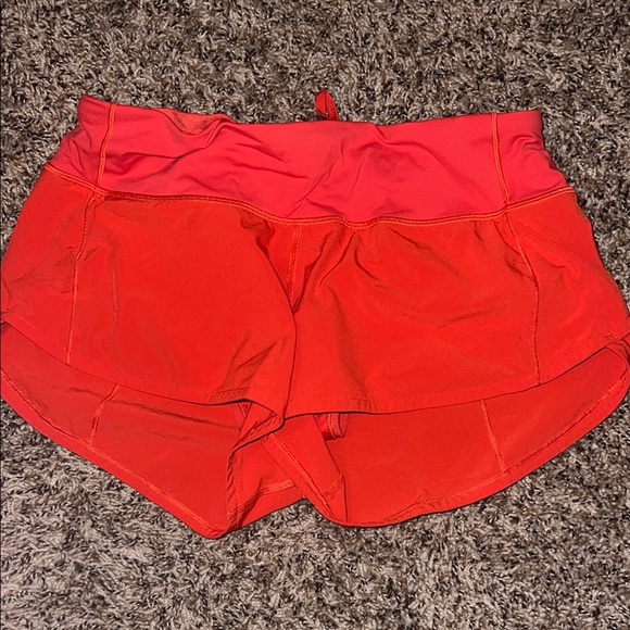 Orangish Red Lululemon Speed up 2” shorts - Picture 1 of 5